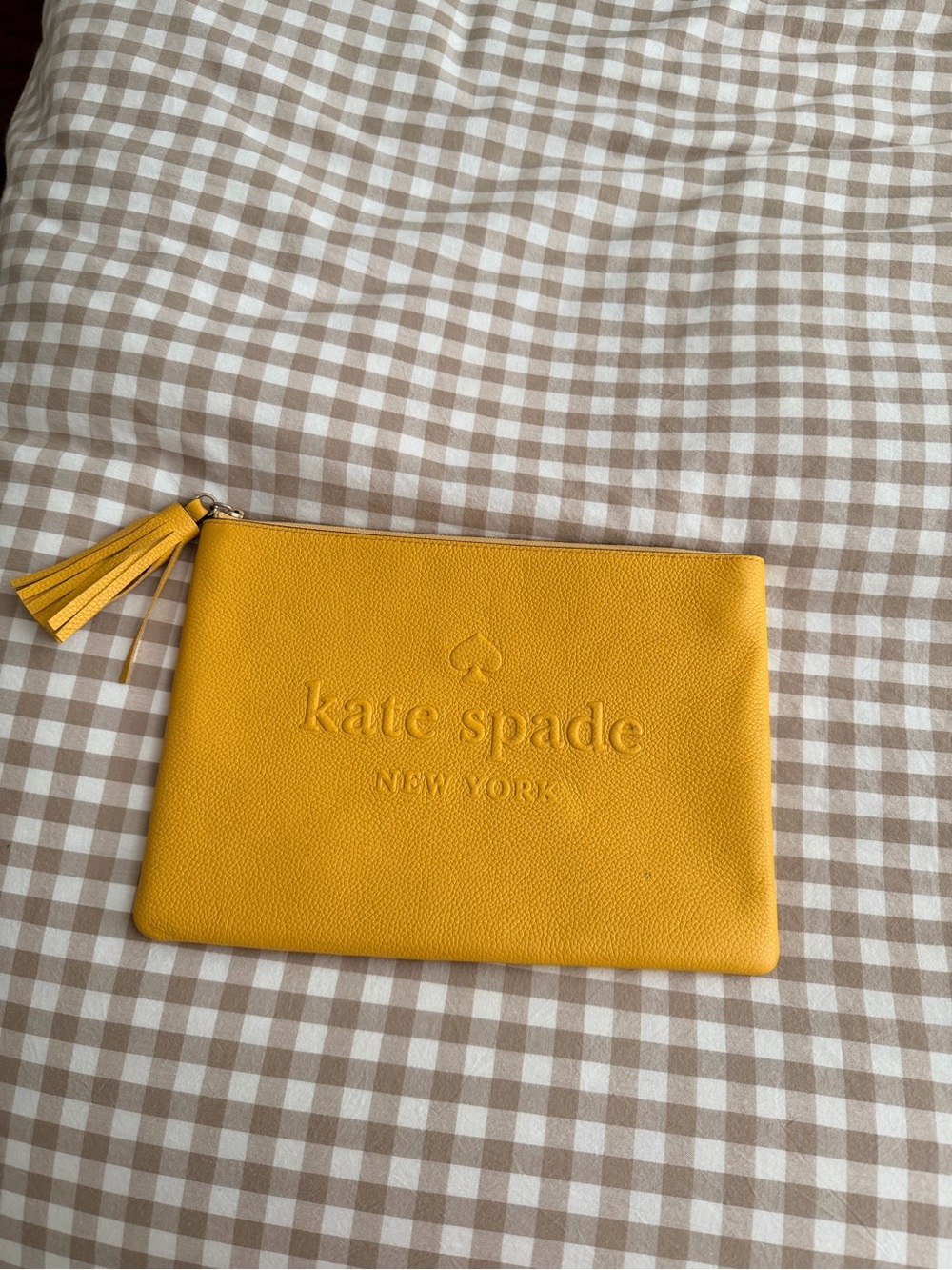 kate spade Yellow Pebbled Leather Zip Clutch with Tassel